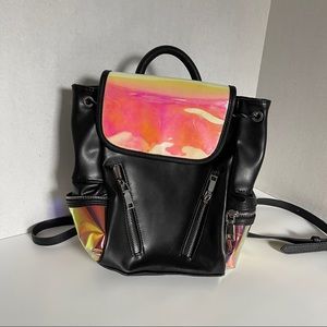 Dolls Kill holographic and black mini backpack